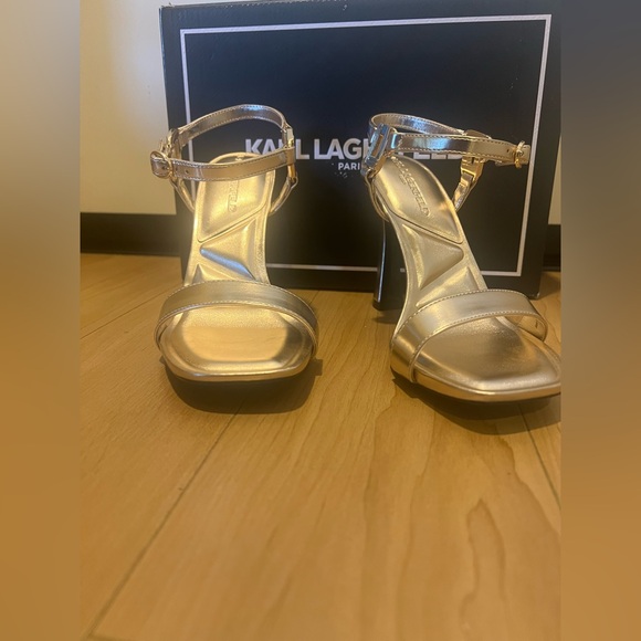 Karl Lagerfeld Shoes - Karl Lagerfeld Metallic Champagne Heels. Size 6 1/2
Brand new in box